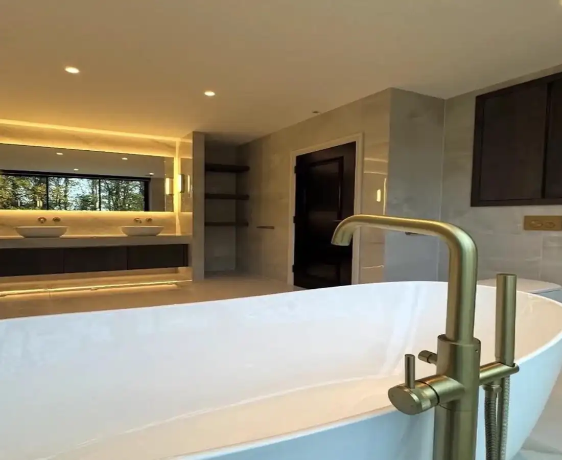 Luxury spa bathroom with freestanding tub and dual vanity in Oklahoma City